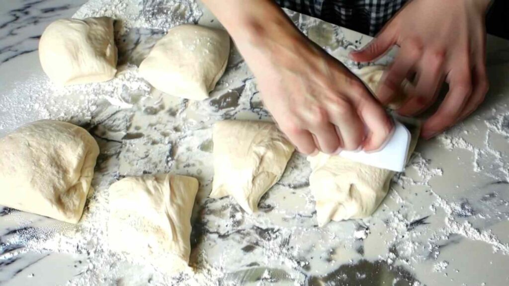 zaatar bagels dividing kneading dough