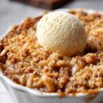 Classic Apple Crumble with golden brown topping in 9x13 baking dish