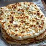 cottage cheese flatbread on baking sheet golden brown edges