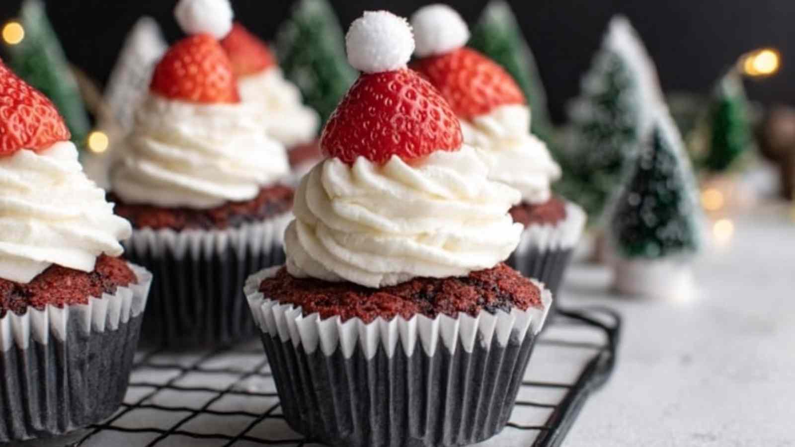 Santa Hat Chocolate Cupcakes with strawberry toppers and vanilla buttercream frosting