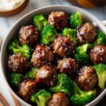 sticky Mongolian meatballs and broccoli over rice with sesame seeds