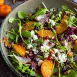 Winter salad with oranges pomegranate feta cheese and candied pecans
