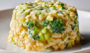 High Protein High Fiber Broccoli Cheddar Rice Cups in muffin tin golden brown and ready to serve