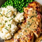 Creamy Boursin Chicken skillet with garlic herb sauce and fresh parsley garnish