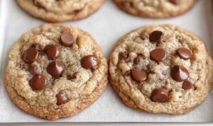 Golden brown sourdough discard breakfast pockets on white plate with crispy edges
