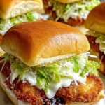 Crispy Chicken Caesar Sandwich with golden panko crust on toasted roll with lettuce