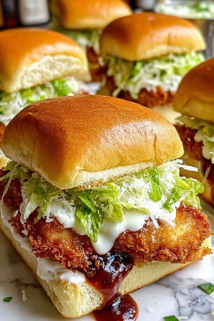Crispy Chicken Caesar Sandwich with golden panko crust on toasted roll with lettuce