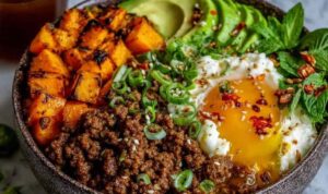 Ground beef hot honey bowl with rice avocado and feta cheese