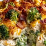 Low carb chicken casserole with melted cheese topping in baking dish
