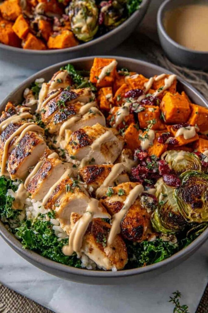 Maple Dijon Chicken Sweet Potato Bowls 6 Maple Dijon Chicken Sweet Potato Bowls with roasted sweet potatoes, sliced chicken breast, spinach, and cranberries
