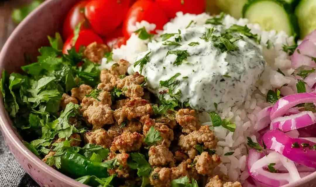 Healthy ground turkey bowls with rice, black beans, avocado, and fresh cilantro