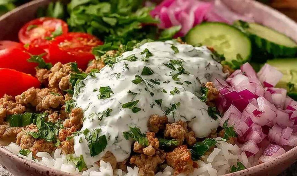 Healthy ground turkey bowls with rice, black beans, avocado, and fresh cilantro
