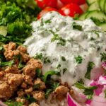 Healthy ground turkey bowls with rice, black beans, avocado, and fresh cilantro