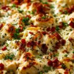 High protein chicken bake in a white baking dish with golden cheese topping fresh from the oven