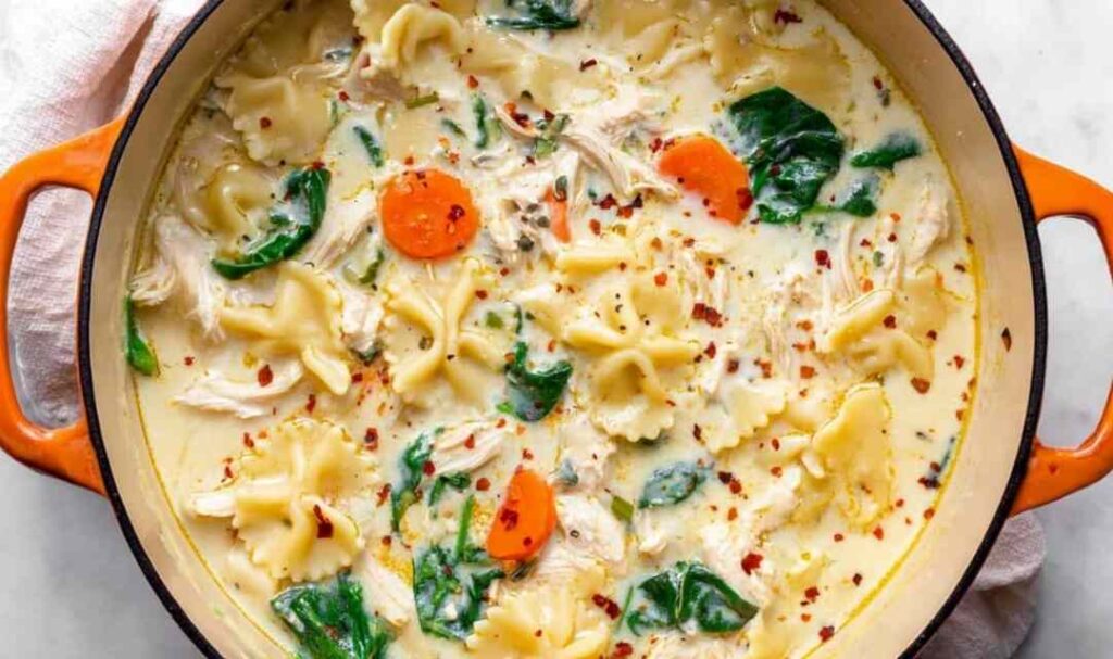 Chicken Alfredo Lasagna Soup 5 A bowl of chicken Alfredo lasagna soup topped with creamy ricotta and red pepper flakes