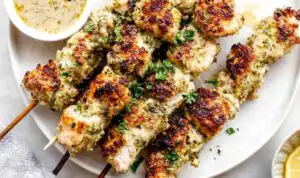 Chicken Spiedini Recipe with Amogio Sauce on a cast iron grill pan with golden Panko crust