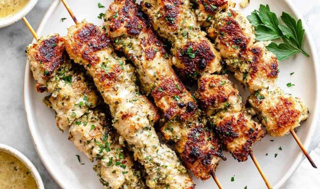 Chicken Spiedini Recipe with Amogio Sauce on a cast iron grill pan with golden Panko crust